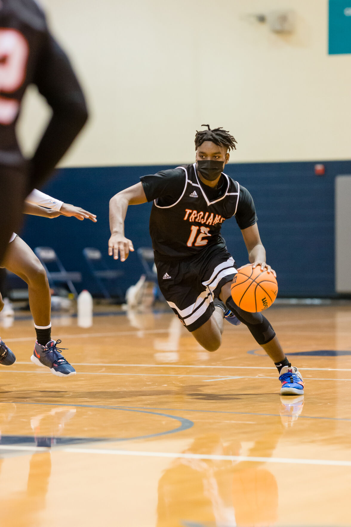Boys Basketball: Hickory Ridge RaginÕ Bulls defeated the Northwest Cabarrus Trojans 64-56.